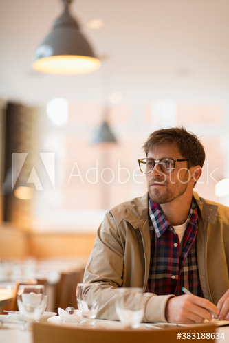 Man working in cafe