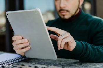 Man working using digital tablet | Free stock photo - 1205234
