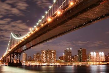 Manhattan Bridge and Manhattan skyline At Night