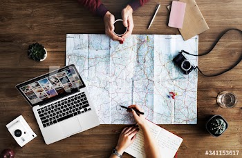 Map lying on wooden table