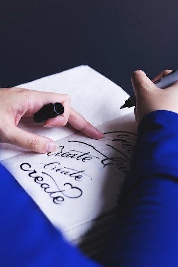 Marker Pen On Notebook