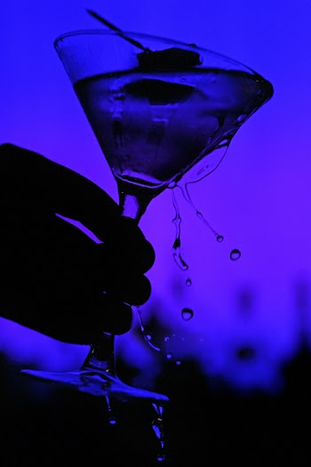 martini glass on blue background