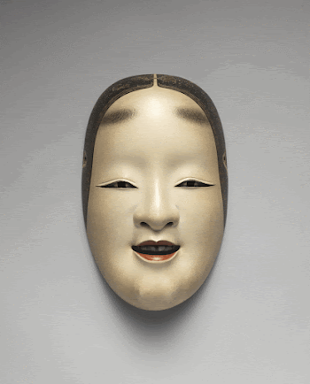 mask of a slightly smiling | Free Photo - rawpixel