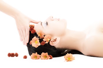 masseuse does relax facial massage to the girl