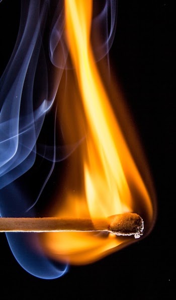 Match Stick Give Orange Fire With a White Smoe