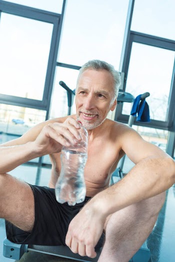 Mature sportsman in gym