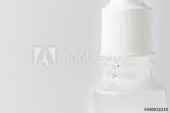 Medical alcohol bottle on a white background