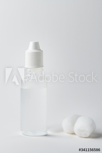 Medical alcohol bottle on a white background