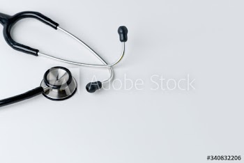 Medical stethoscope on a white background