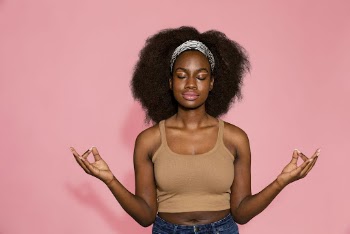 Meditating woman on pink background | Free Photo - rawpixel