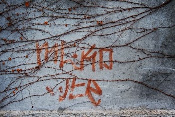 Meko Wer text on gray wall