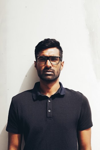 Men's Black Polo Shirt Close-up Photography