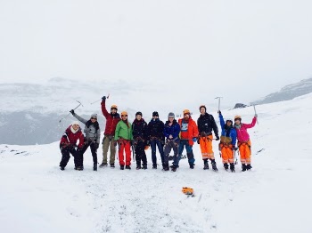Men and Women at the Mountain Covered With Snow