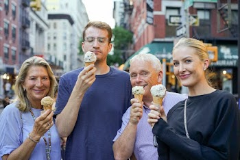 Men and Women Holding Ice Creams