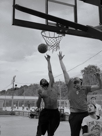 Men Playing Basketball