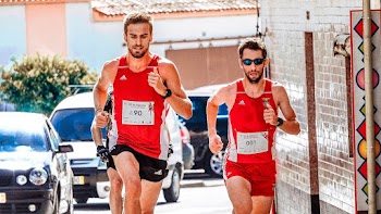 Men Running on Street Near Vehicles