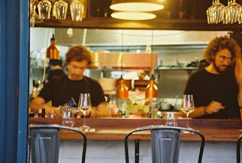 Men Standing Near  Counter 