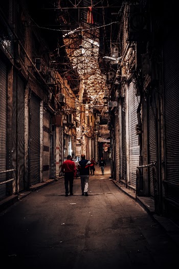 Men Walking in the Reclusion of Grand Bazaar 