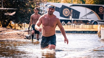 Men Walking in Water