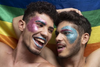 Men with Glitter Face Paint