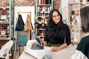 Merchant Showing Customer Pos Ipad