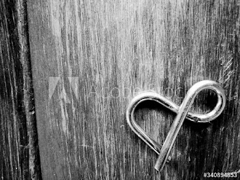 Metal and sign on wooden background
