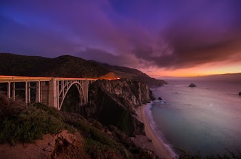 Metal Bridge on Beach during Sunset