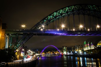 Metal Bridge With Green and Purple Lights
