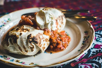 Mexican burrito with cream 