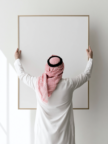 Middle Eastern Man Holding Empty Picture Frame