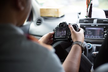 Midsection of Man Using Mobile Phone
