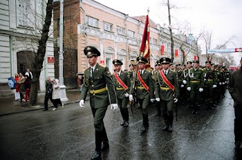 Military Personnel Parades on Road