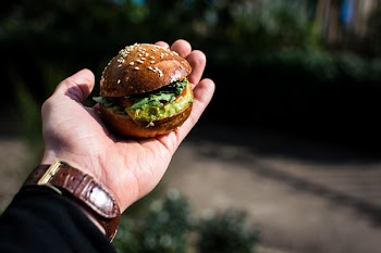 Mini burger with guacamole outside 