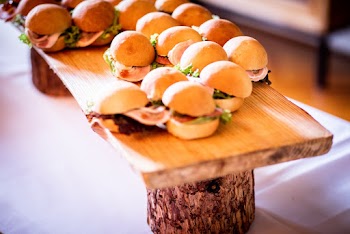 Mini-Burgeres on Brown Wooden Chopping Board