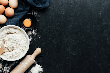 Minimal Rustic Baking Flat Lay with Flour and Eggs
