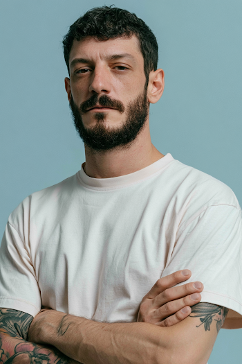 Minimalist White T-Shirt on Blue Background
