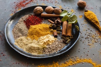 Mix of indian spices with nuts Free Photo