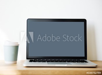 Mockup computer laptop on wooden table