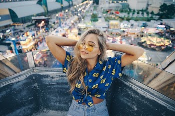 Model Poses Casually On Ride
