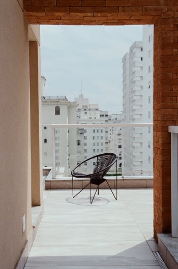 Modern chair on balcony of modern building · Free Stock Photo