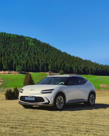 Modern Electric SUV in Scenic Landscape