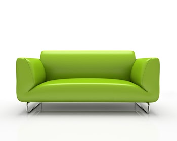 Modern green sofa isolated on white background