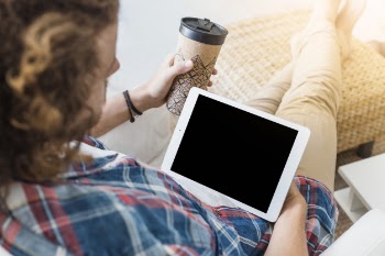 Modern man with table on couch