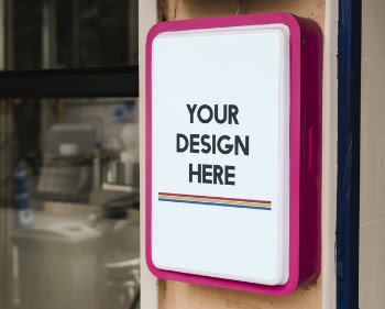 Modern shop sign mockup with bold pink frame Free Psd