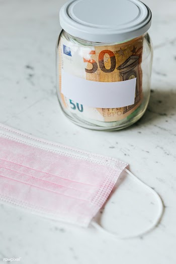 Money savings in a jar during the COVID-19 pandemic | Free  photo - 2348443