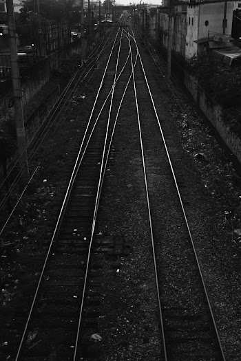 Monochrome Photo of Empty Railway Tracks