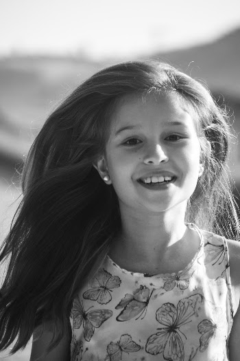 Monochrome Photo Of Girl Smiling