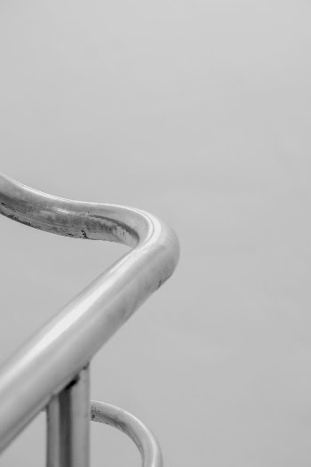 Monochrome Photo of Handrail