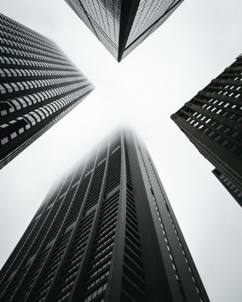 Monochrome Photo of High-Rise Buildings · Free Stock Photo