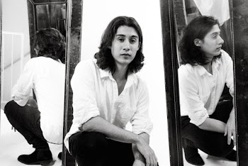 Monochrome Photo Of Man Beside Mirror